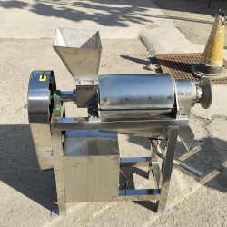 Machine à extraire le jus